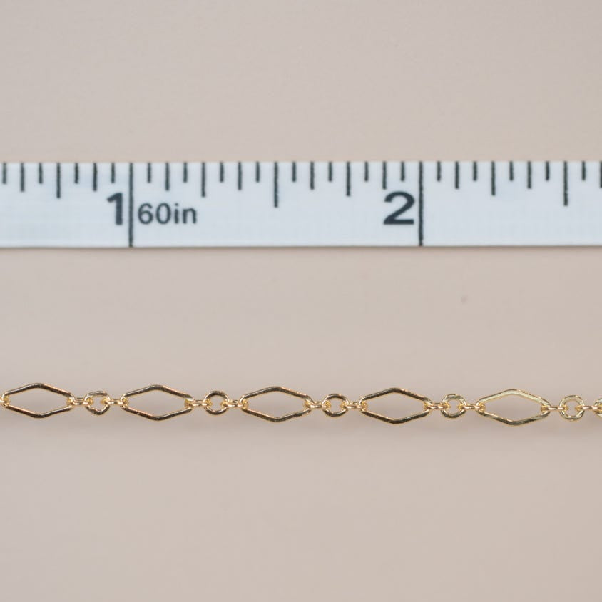 New gold chain arrival, measured with ruler.