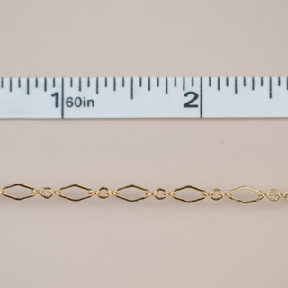 New gold chain arrival, measured with ruler.