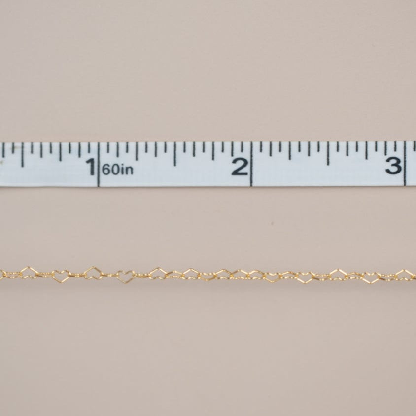 Gold chain with ruler measurement