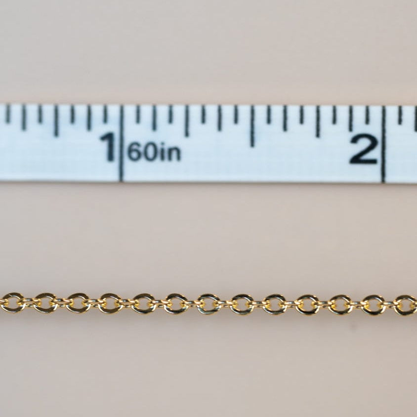 Permanent jewelry chain measured to 2 inches.