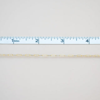 Permanent jewelry chain being measured