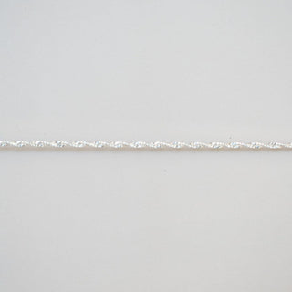 Permanent jewelry chain detail.