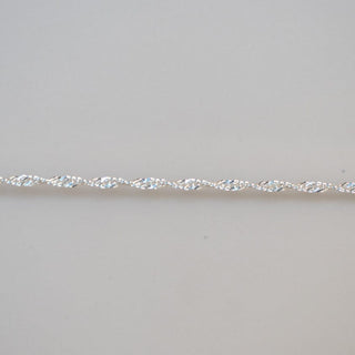 Permanent Jewelry Chain - 40 - Close-up of a delicate silver chain.