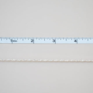 Permanent jewelry chain with measuring tape