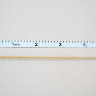 Permanent jewelry chain measured at 4 inches