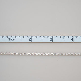 Permanent jewelry chain with ruler for sizing