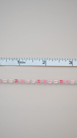 Pink Oasis Glitter bead strand with ruler