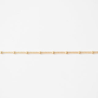 Gold chain on a white background