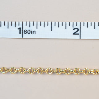 Gold chain 13-29 inches long, measured with tape.