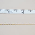 Gold chain measured with ruler