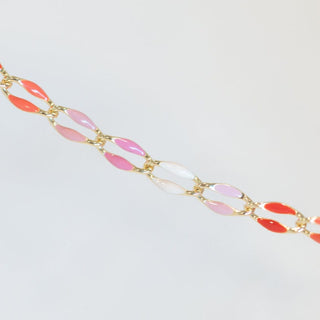Colorful beaded necklace on white background
