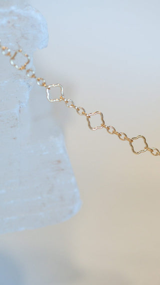 Delicate gold chain bracelet with square links
