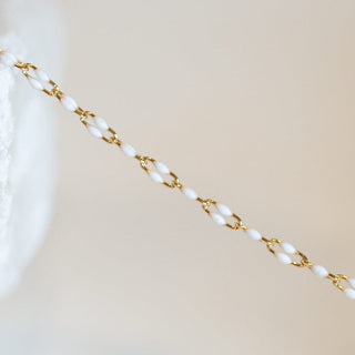 Delicate gold and pearl chain necklace