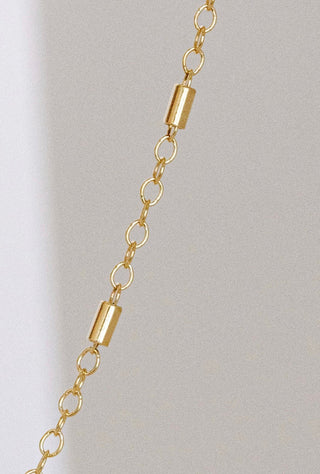 Gold chain necklace with cylindrical beads