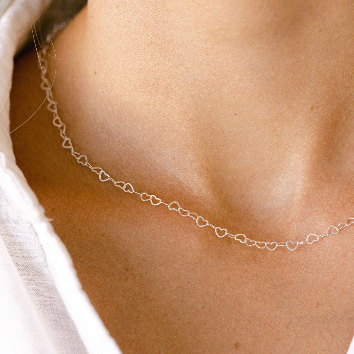 Heart necklace on a neck - image_35b5c3ba