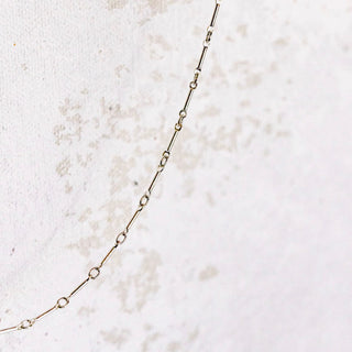 Delicate chain necklace detail