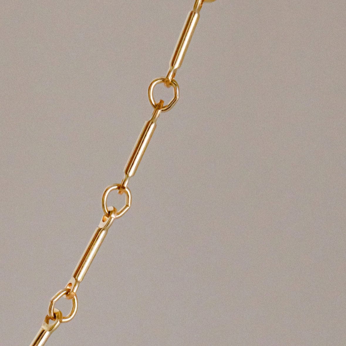 Gold chain necklace detail