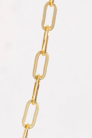 Gold chain necklace detail