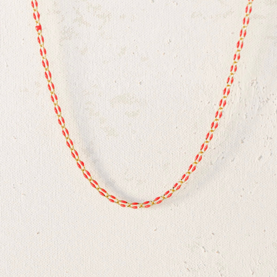 Red and gold chain necklace