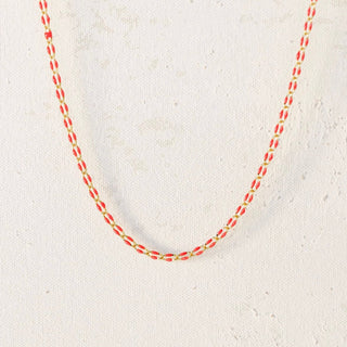 Red and gold chain necklace