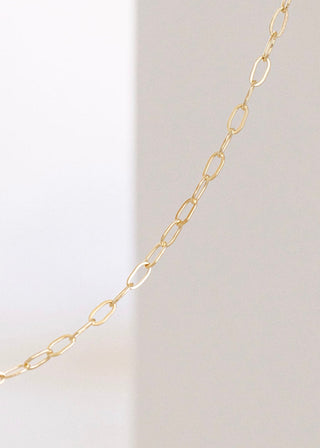 Gold chain necklace detail