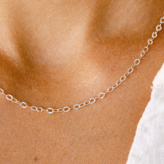 Silver chain necklace detail
