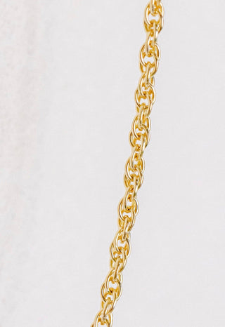 Gold chain necklace detail