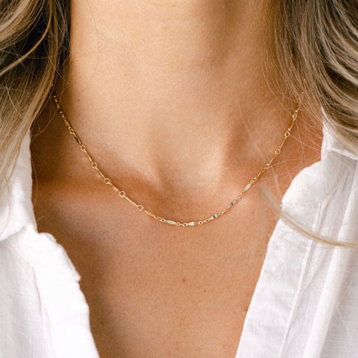 Gold necklace on woman, image_b4d458d5