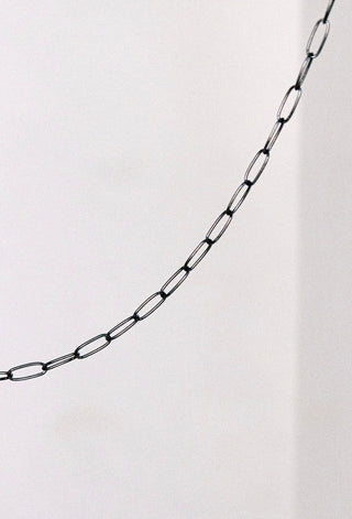 Black chain against white background