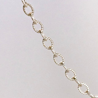 Silver chain necklace detail