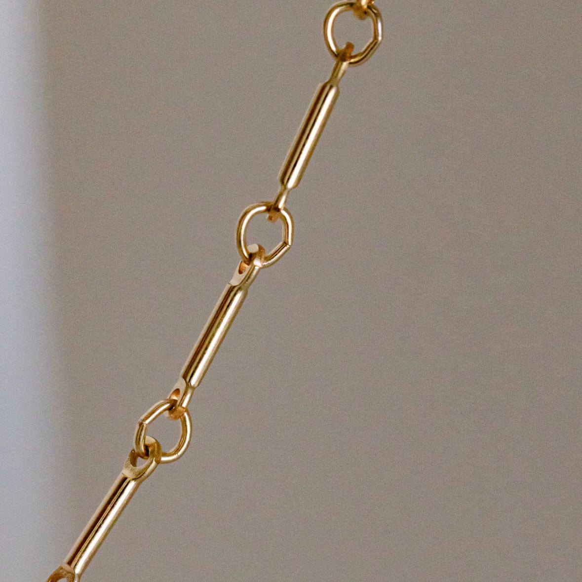 Gold chain necklace detail