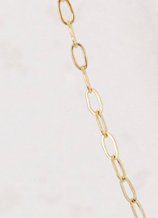 Gold chain necklace detail