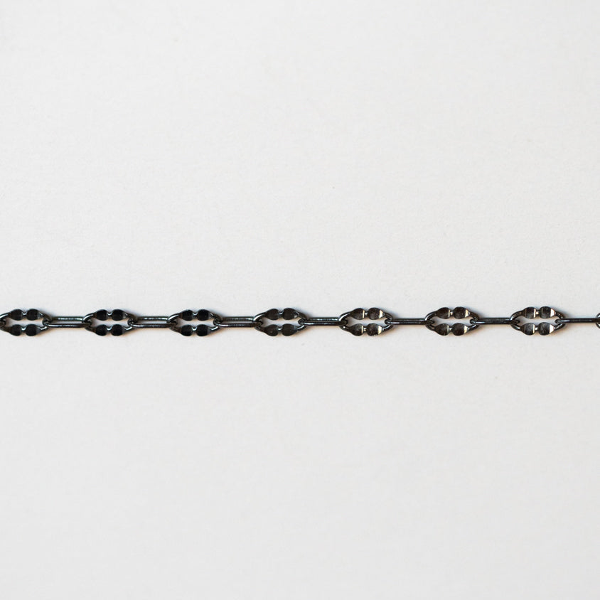Metallic chain on a white background