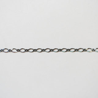 Thin chain on a light gray background