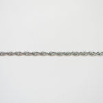 Silver braided chain on a white background