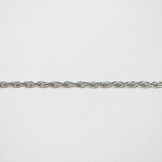 Silver braided chain on a white background