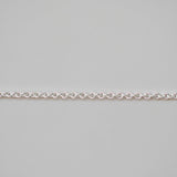 Silver chain on a light gray background