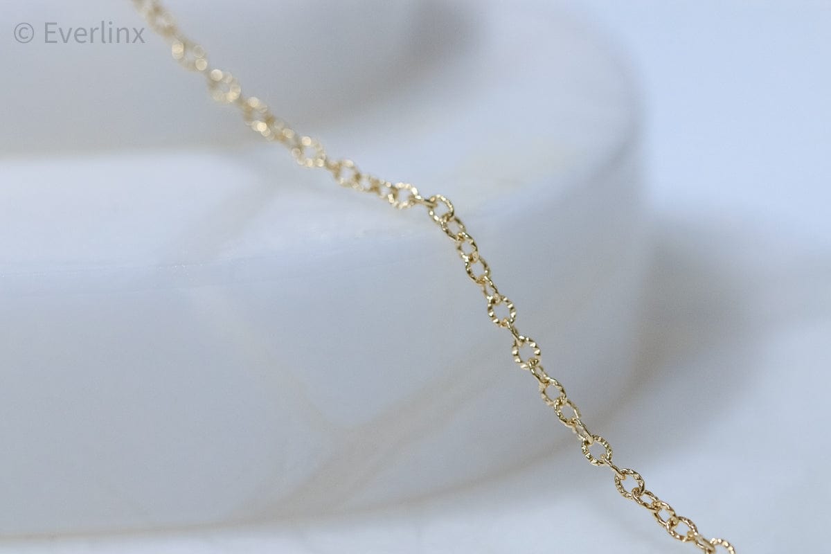 Gold chain necklace detail